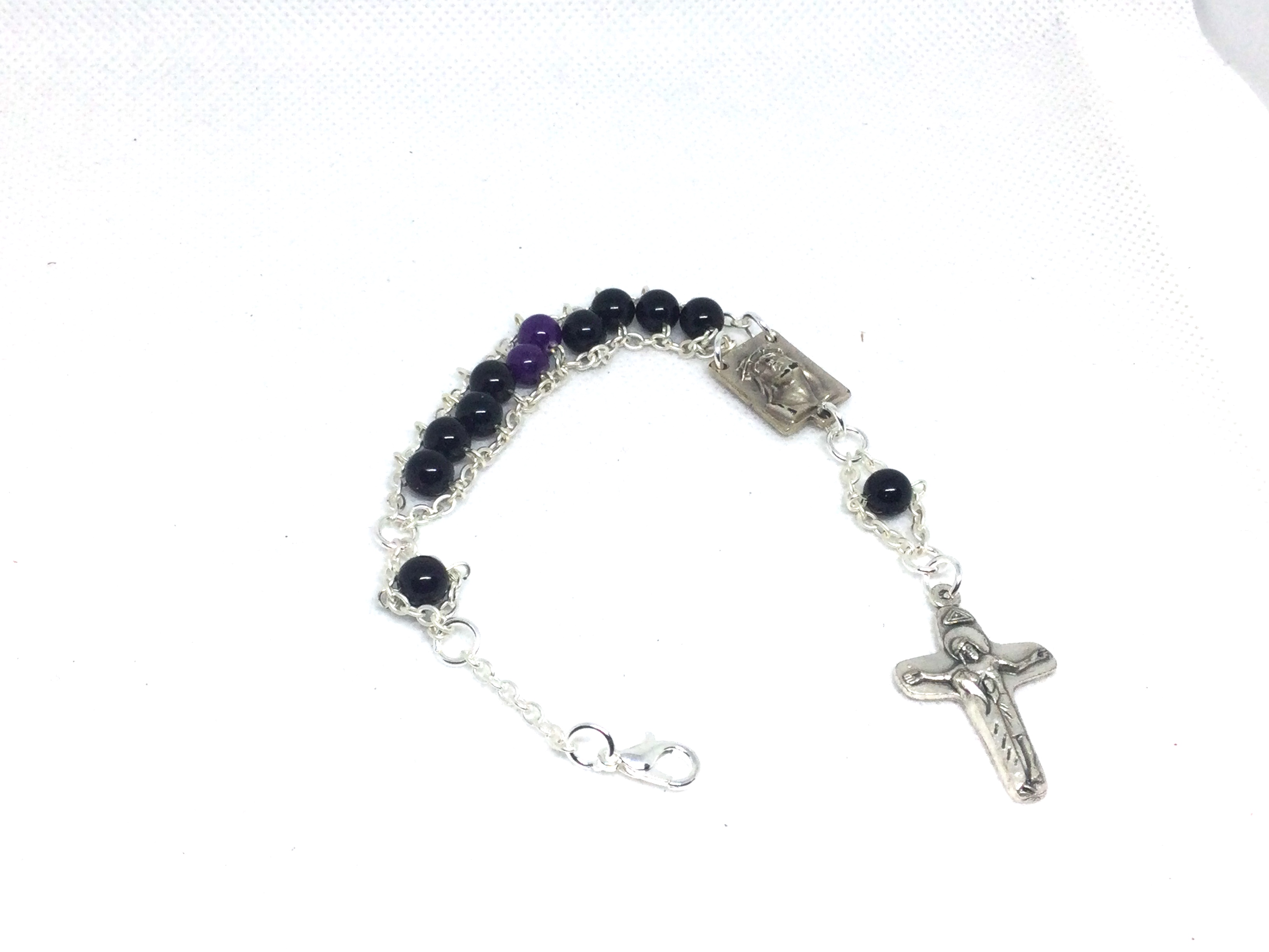 Praying with the Holy Rosary - Beautiful Handmade Rosary Bracelets